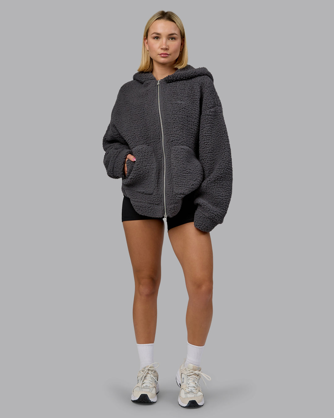 Woman wearing Sherpa Oversized Jacket - Dark Storm | Model:Halle | Size:XS - view 17