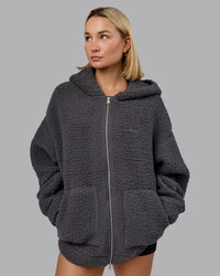 Woman wearing Sherpa Oversized Jacket - Dark Storm | Model:Halle | Size:XS | Thumbnail Index: 1