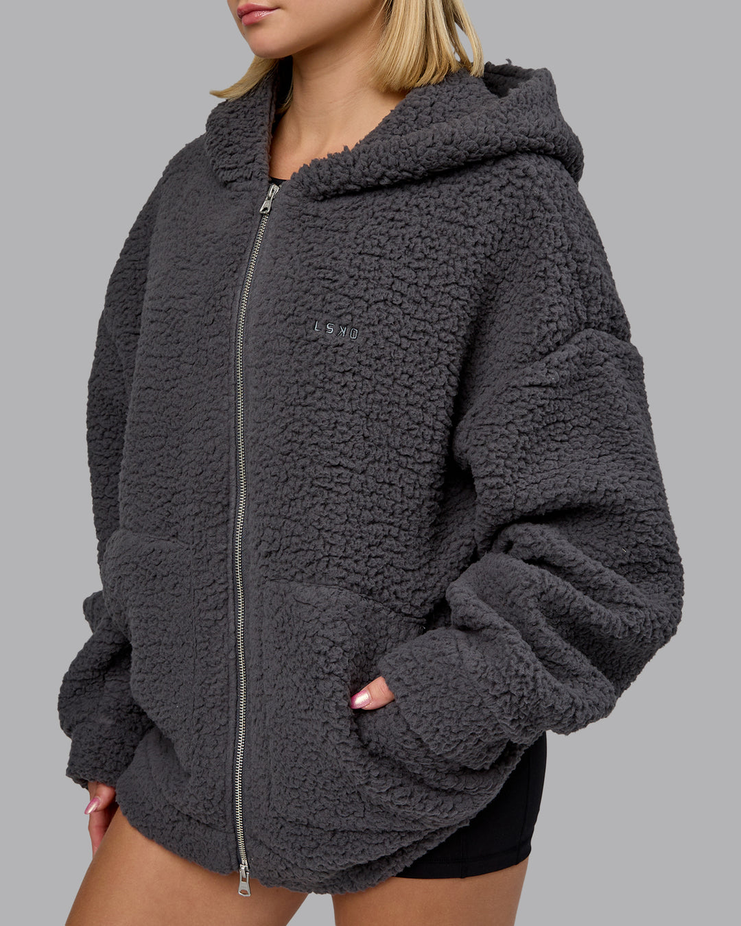 Woman wearing Sherpa Oversized Jacket - Dark Storm | Model:Halle | Size:XS - view 8