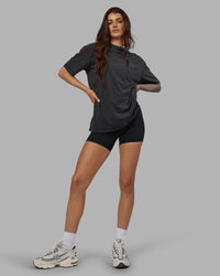 Woman wearing Unisex Strike Through FLXCotton Tee Oversize - Black Washed-Cantaloupe | Model:Phoebe | Size:XS | Thumbnail Index: 7