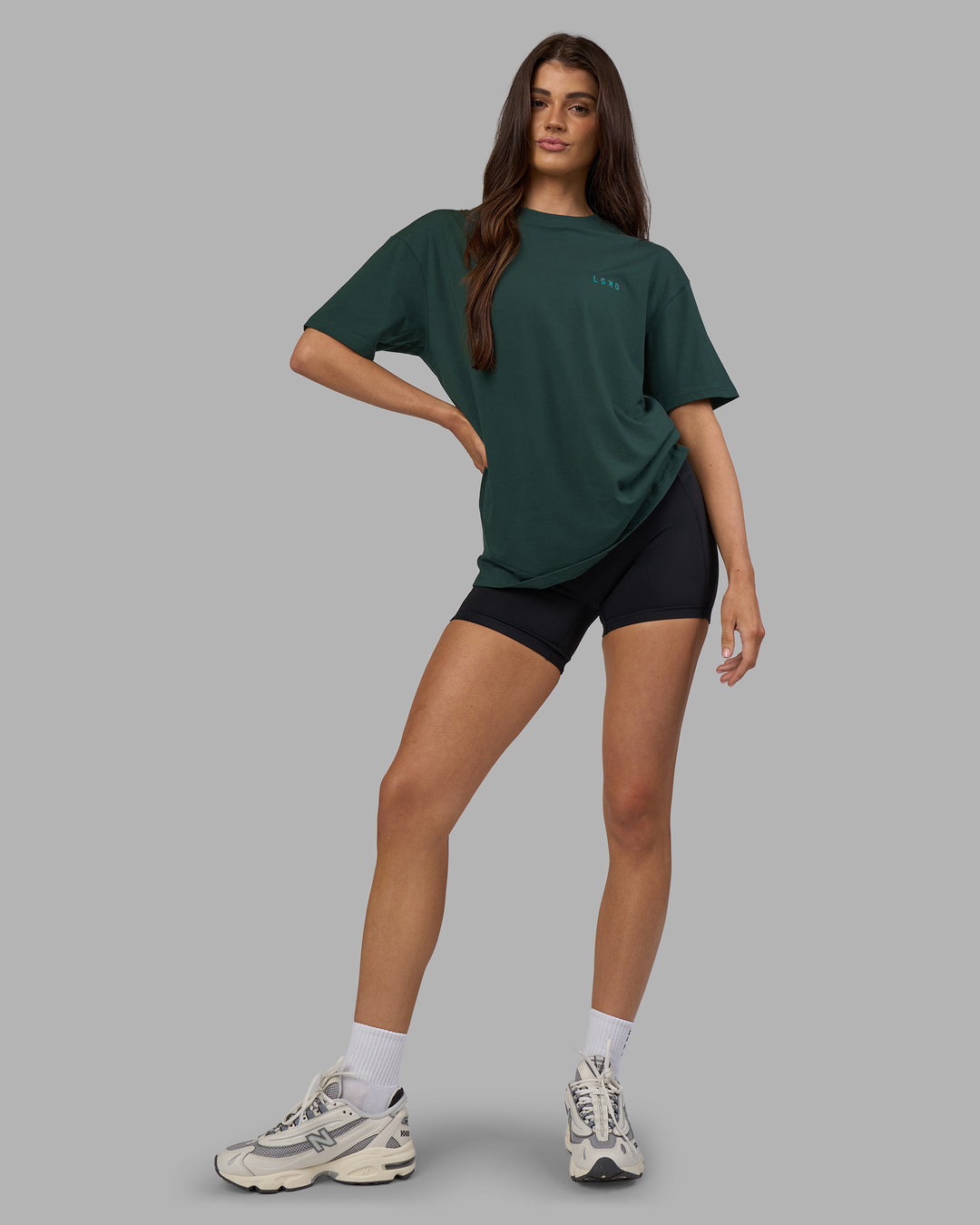 Woman wearing Unisex Strike Through FLXCotton Tee Oversize - Vital Green-Alexandrite | Model:Phoebe | Size:XS - view 7