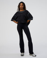 Woman wearing Urban Blur Heavyweight Unisex Oversized Tee - Black-Dark Storm | Model:Jordan | Size:S | Thumbnail Index: 3