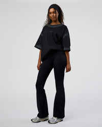 Woman wearing Urban Blur Heavyweight Unisex Oversized Tee - Black-Dark Storm | Model:Jordan | Size:S | Thumbnail Index: 7