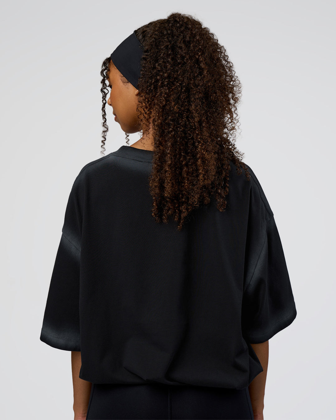 Woman wearing Urban Blur Heavyweight Unisex Oversized Tee - Black-Dark Storm | Model:Jordan | Size:S - view 6