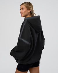 Woman wearing Urban Blur Unisex Oversized Hoodie - Black-Dark Storm | Model:Leilani | Size:XS | Thumbnail Index: 4