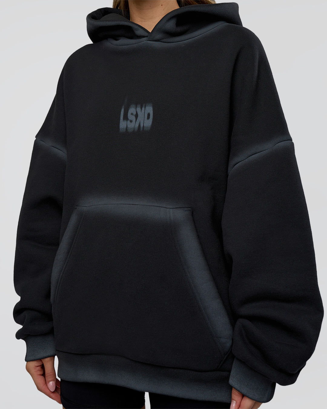Woman wearing Urban Blur Unisex Oversized Hoodie - Black-Dark Storm | Model:Leilani | Size:XS - view 12