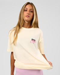 Woman wearing Values Run Club FLXCotton Tee - Off White-Candy Pink | Model:Georgia | Size:XS | Thumbnail Index: 4