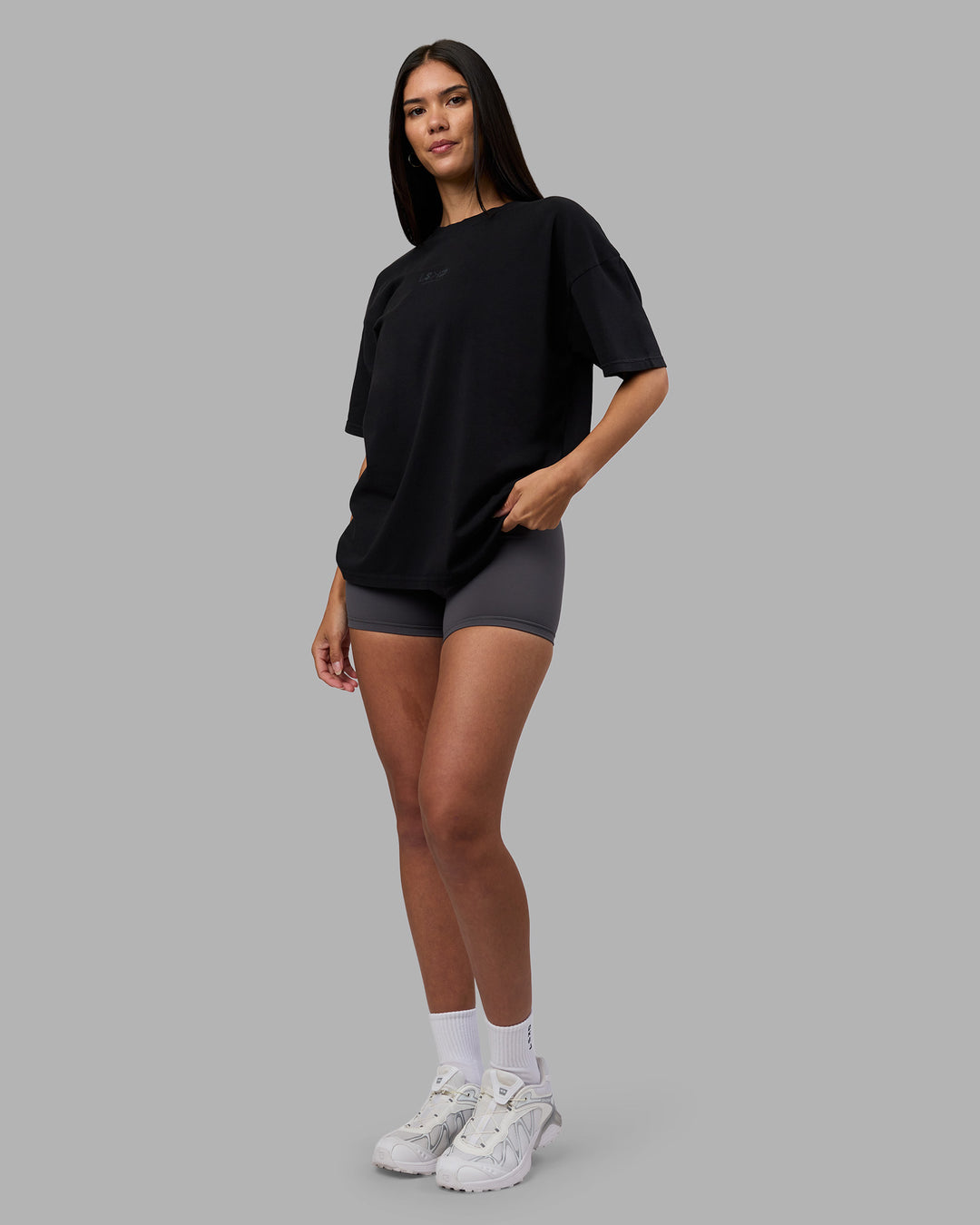 Woman wearing Variation Heavyweight FLXCotton Oversized Tee - Black-Black | Model:Rhiley | Size:XS - view 4