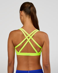 Woman wearing Velocity Sports Bra - Lime Glo | Model:Brylee | Size:XS | Thumbnail Index: 4