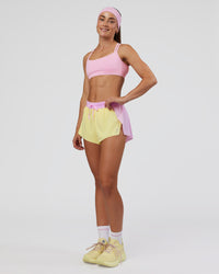Woman wearing Velocity Sports Bra - Marshmallow | Model:Grace | Size:XS | Thumbnail Index: 2