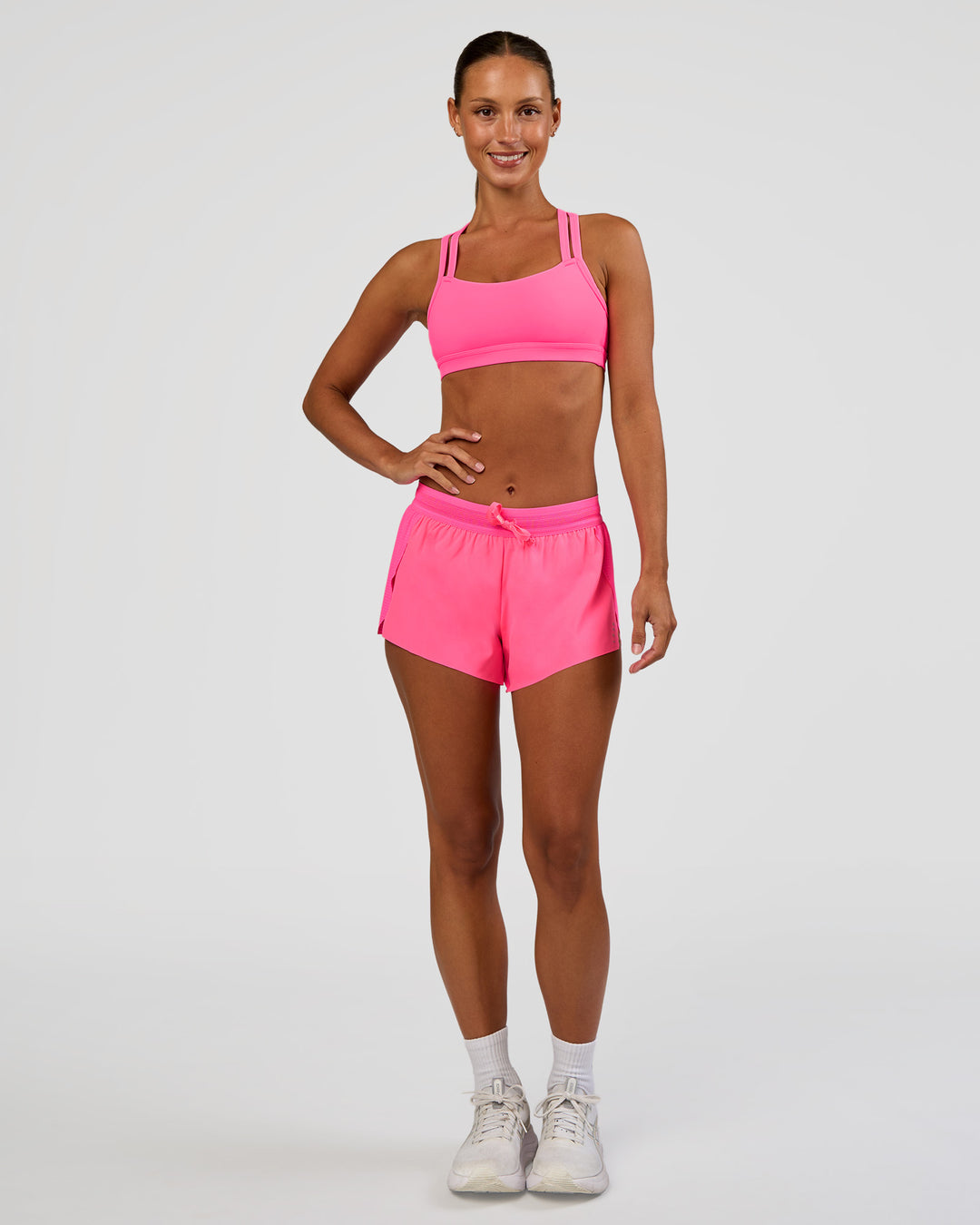 Woman wearing Velocity Sports Bra - Sugar Plum | Model:Brylee | Size:XS - view 6