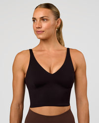 Woman wearing Vitality Long Line Sports Bra - Black | Model:Maja | Size:XS | Thumbnail Index: 0