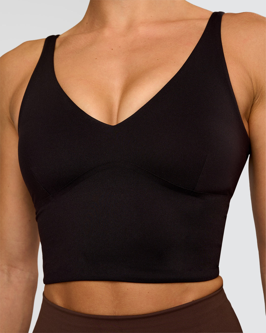 Woman wearing Vitality Long Line Sports Bra - Black | Model:Maja | Size:XS - view 5