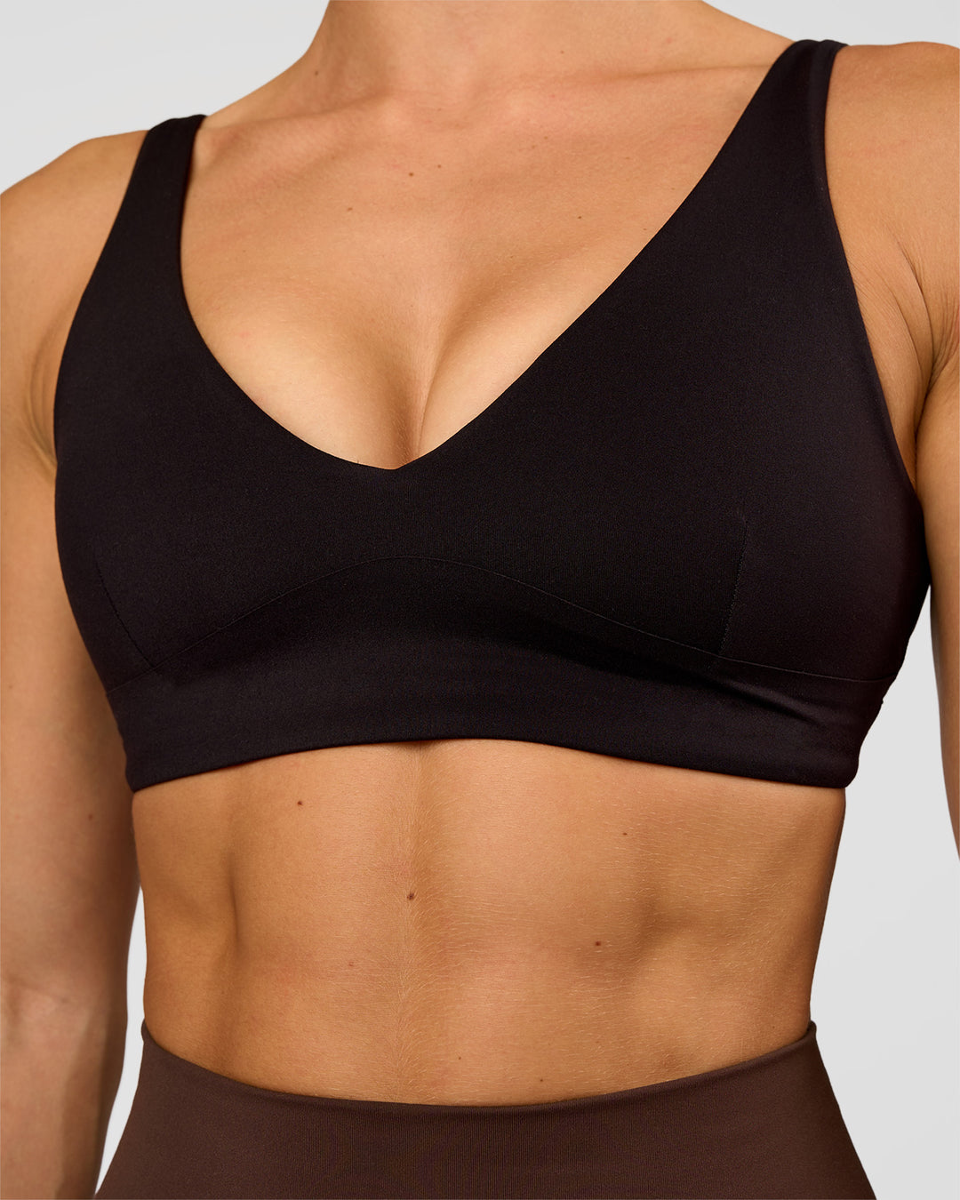 Woman wearing Vitality Sports Bra - Black | Model:Maja | Size:XS - view 4