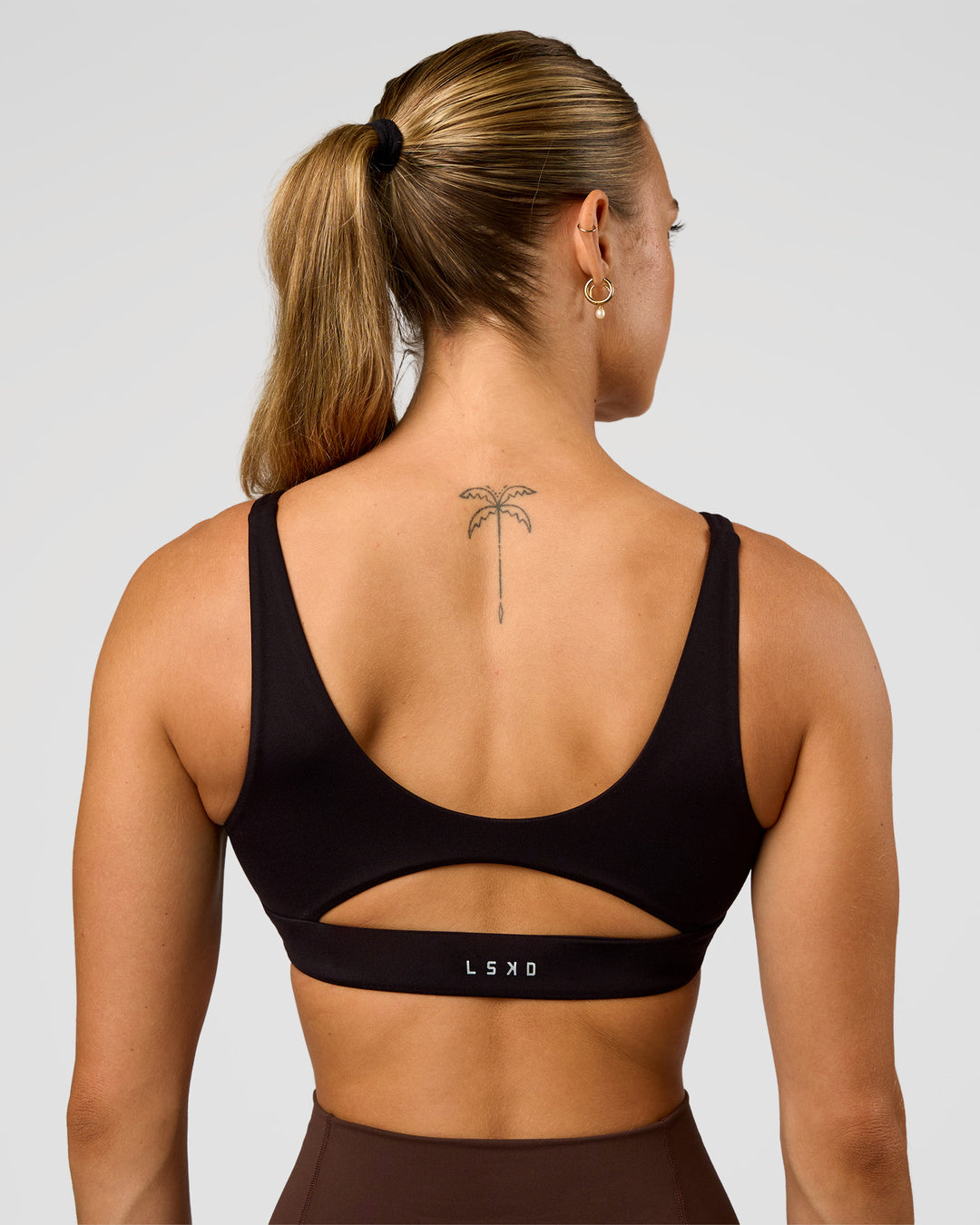 Woman wearing Vitality Sports Bra - Black | Model:Maja | Size:XS - view 2