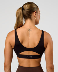 Woman wearing Vitality Sports Bra - Black | Model:Maja | Size:XS | Thumbnail Index: 1