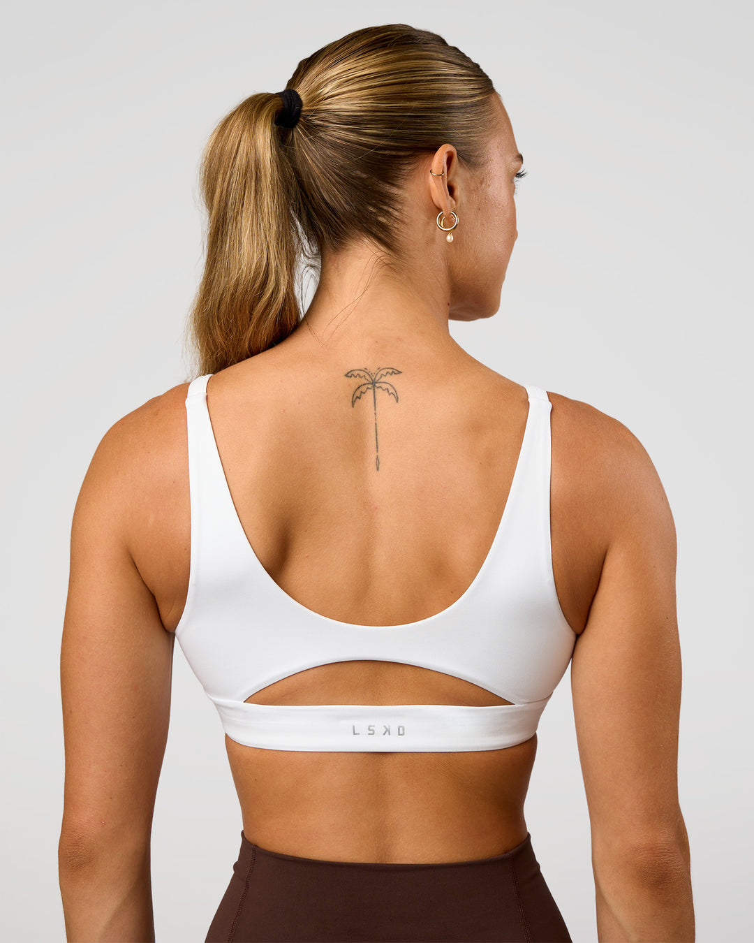 Woman wearing Vitality Sports Bra - White | Model:Maja | Size:XS - view 8