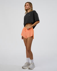 Woman wearing We Love This  FLXCotton Oversized Tee - Black Washed-White | Model:Leilani | Size:XS | Thumbnail Index: 7