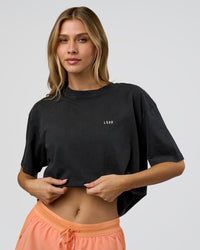 Woman wearing We Love This  FLXCotton Oversized Tee - Black Washed-White | Model:Leilani | Size:XS | Thumbnail Index: 4