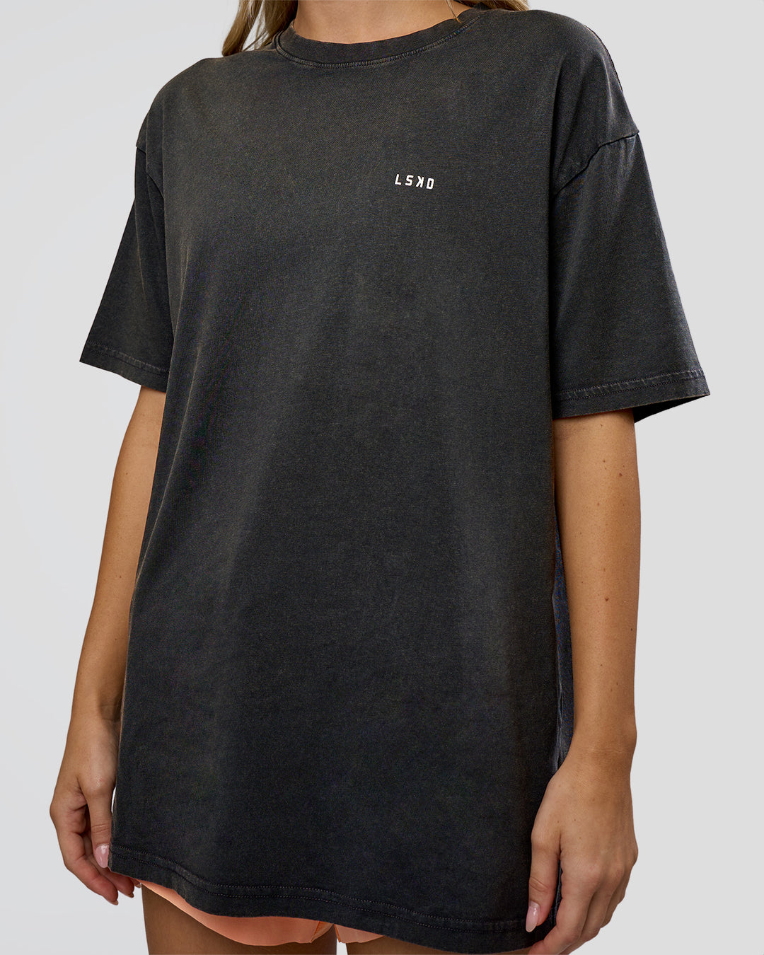 Woman wearing We Love This  FLXCotton Oversized Tee - Black Washed-White | Model:Leilani | Size:XS - view 9