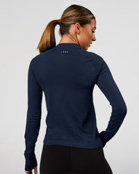 Woman wearing AeroFLX+ Long Sleeve Half Zip - Future Navy/Future Navy | Model:Charli | Size:XS | Thumbnail Index: 2