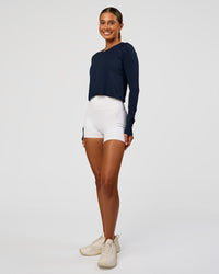 Woman wearing AeroFLX+ Seamless Long Sleeve Skimmer Tee - Future Navy/Future Navy | Model:Charli | Size:XS | Thumbnail Index: 9