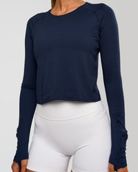 Woman wearing AeroFLX+ Seamless Long Sleeve Skimmer Tee - Future Navy/Future Navy | Model:Charli | Size:XS | Thumbnail Index: 8