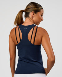 Woman wearing AeroFLX+ Seamless Tank - Future Navy/Future Navy | Model:Charli | Size:XS | Thumbnail Index: 2