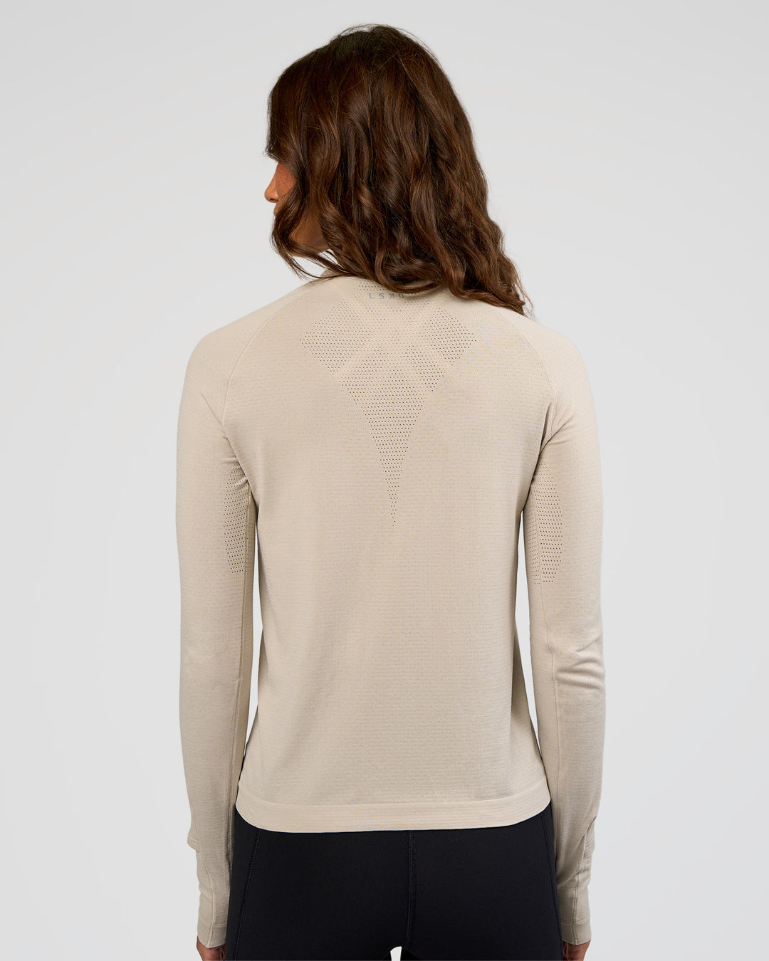 Woman wearing AeroFLX+ Long Sleeve Half Zip - Shale Beige/Shale Beige | Model:Dakota | Size:XS - view 3