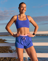 Campaign image of Accelerate Synergy 3" Running Short Short - Power Cobalt-Pink Rose | Thumbnail Index: 2