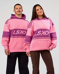 Duo wearing A-Team Oversized Hoodie - Candy Pink-Boysenberry | Model:Jaiden | Size:L | Model:Bianca | Size:S | Thumbnail Index: 0