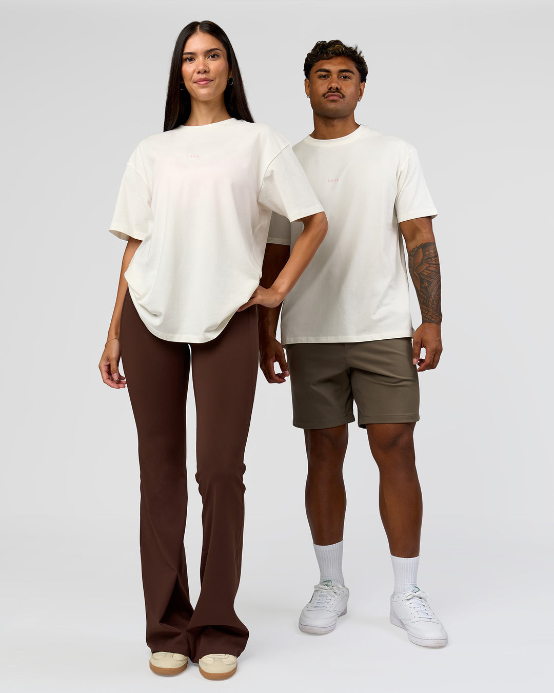Duo wearing Built On Values FLXCotton Oversized Tee - Off White-Pink Rose | Model:Xav | Size:L | Model:Rhiley | Size:XS - view 5