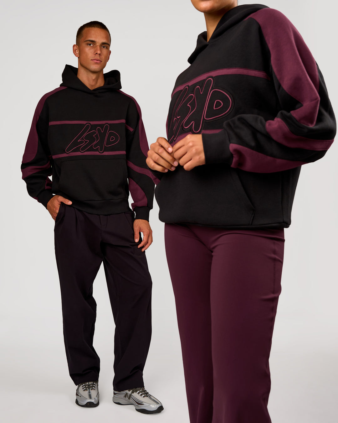 Duo wearing Vibe Oversized Hoodie - Black-Cherry Lacquer | Model:Albert | Size:M | Model:Rosie | Size:S - view 1