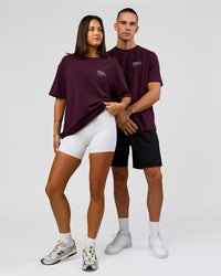 Duo wearing Coffee Run FLXCotton Oversized Tee - Cherry Lacquer-Black | Model:Albert | Size:M | Model:Bianca | Size:XS | Thumbnail Index: 6