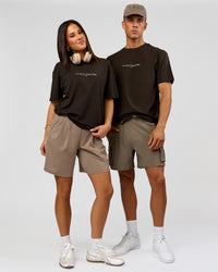 Duo wearing VS6 1% Better FLXCotton Oversize Tee - Ground Coffee | Model:Albert | Size:M | Model:Bianca | Size:XS | Thumbnail Index: 7