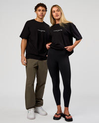 Duo wearing VS6 1% Better FLXCotton Oversize Tee - Black | Model:Leandro | Size:M | Model:Issy | Size:XS | Thumbnail Index: 3