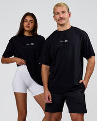 Duo wearing Deadly Runners Run Club FLXCotton Oversize Tee - Black | Model:Bella | Size:S | Model:Jaiden | Size:M | Thumbnail Index: 7