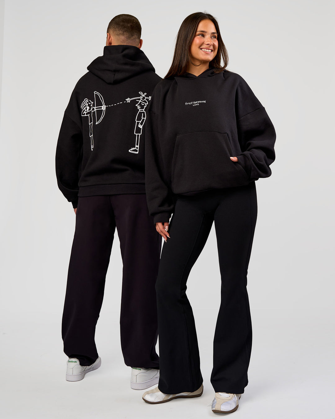 Duo wearing Andrew J. Steel x LSKD Boxy Hoodie - Black | Model:Bianca | Size:S | Model:Jaiden | Size:L - view 1