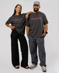 Duo wearing VS6 1% Better Fathers Day FLXCotton Oversized Tee - Dark Storm | Model:Jess | Size:S | Model:Jordan | Size:XL | Thumbnail Index: 1