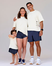Duo wearing Greatest of All Time Heavyweight FLXCotton Oversized Tee - Off White Washed-Scarlet | Model:Tia | Size:S | Model:Shane | Size:L | Thumbnail Index: 23