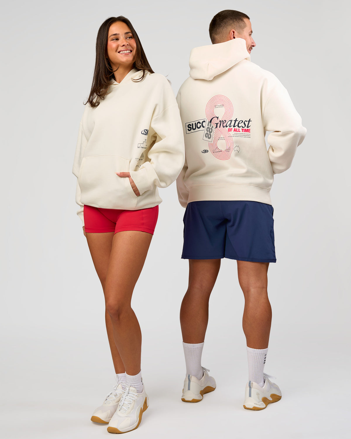 Duo wearing Greatest of All Time Heavyweight Oversized Hoodie - Off White | Model:Bianca | Size:XS | Model:Jaiden | Size:L