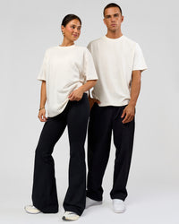 Duo wearing Tonal Legacy Heavyweight Oversized Tee - Off White-Off White | Model:Bianca | Size:XS | Model:Albert | Size:M | Thumbnail Index: 3