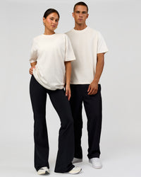 Duo wearing Tonal Legacy Heavyweight Oversized Tee - Off White-Off White | Model:Bianca | Size:XS | Model:Albert | Size:M | Thumbnail Index: 6