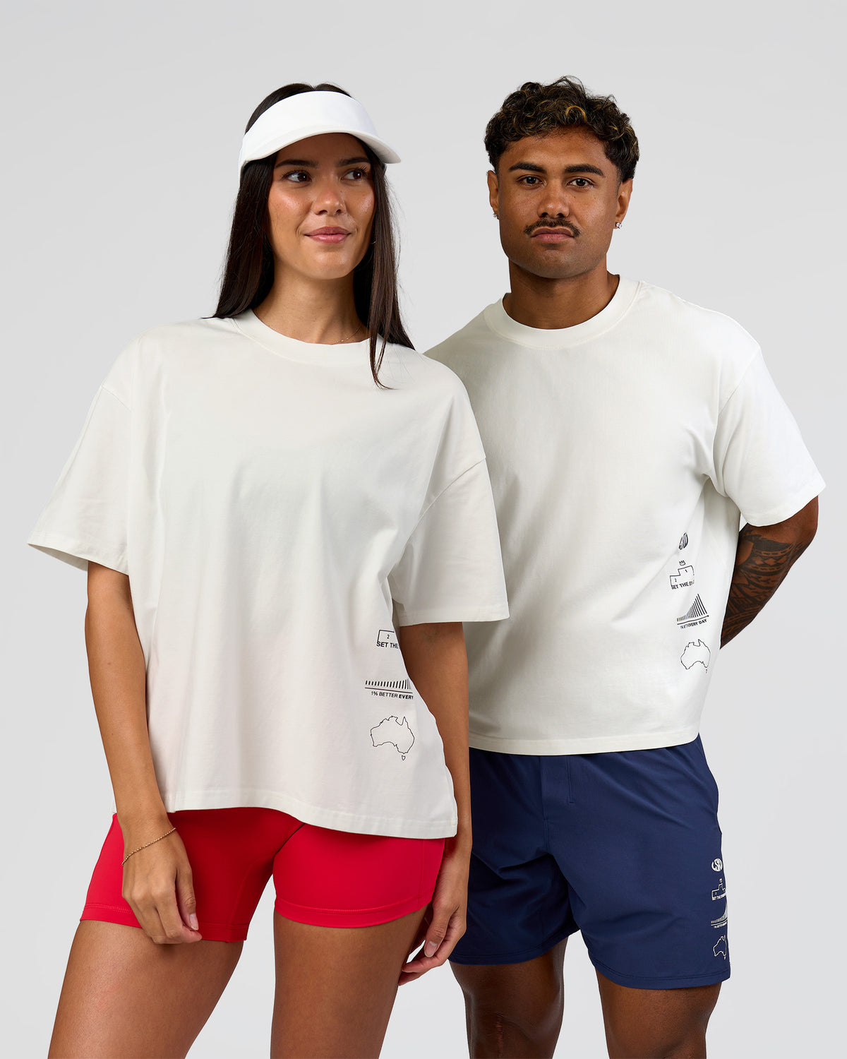 Duo wearing Greatest of All Time Heavyweight FLXCotton Boxed Tee - Off White Washed | Model:Rhiley| Size:XS | Model:Xav | Size:L