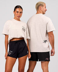 Duo wearing Hybrid Elements Heavyweight FLXCotton Oversized Tee  - Silver Marl | Model:Charli | Size:XS | Model:Jaiden | Size:L | Thumbnail Index: 0