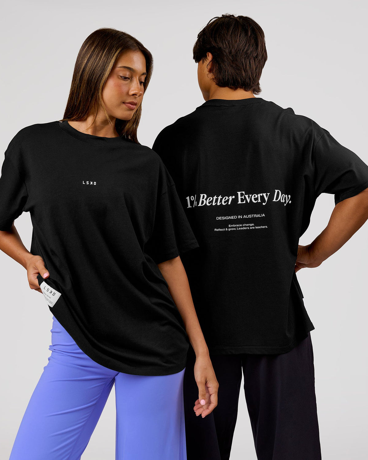 Duo wearing VS26 1% Better FLXCotton Oversize Tee - Black-White | Model:Charli | Size:XS | Model:George | Size:M - view 1