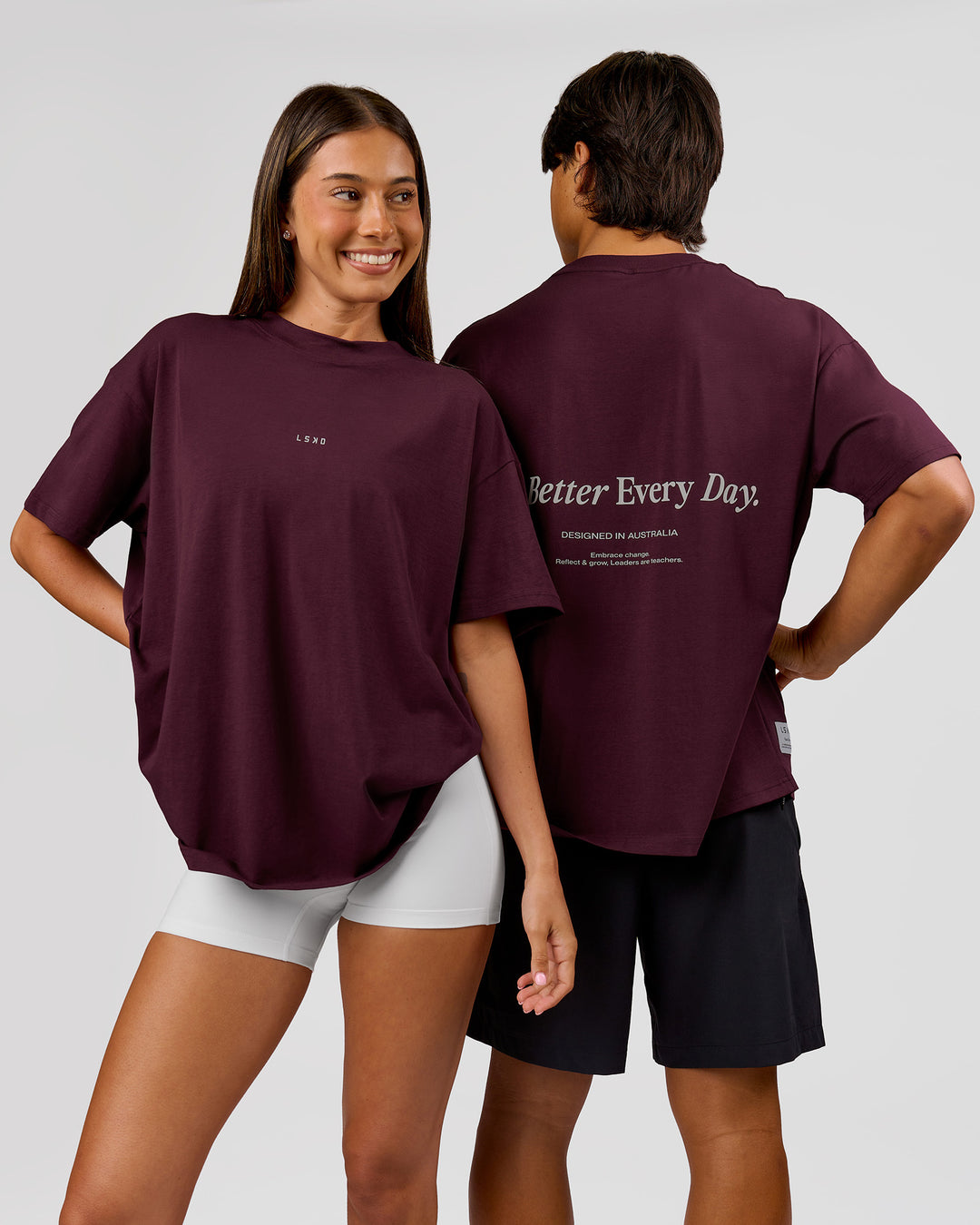 Duo wearing VS26 1% Better FLXCotton Oversize Tee - Cherry Lacquer-Off White | Model:Charli | Size:XS | Model:George | Size:M - view 1