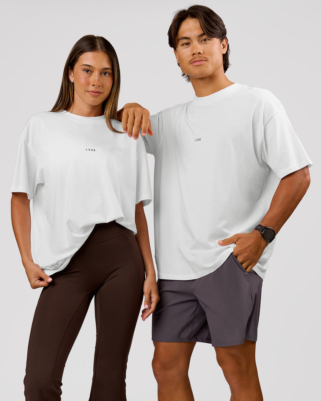Duo wearing VS26 1% Better FLXCotton Oversize Tee - White-Black | Model:Charli | Size:XS | Model:George | Size:M - view 4