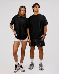 Duo wearing VS26 Journey FLXCotton Oversize Tee - Black-White | Model:Charli | Size:XS | Model:George | Size:M | Thumbnail Index: 3