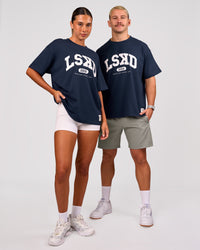 Duo wearing Varsity EST Heavyweight Oversized Tee  - Future Navy-White | Model:Charli | Size:XS | Model:Jaiden | Size:M | Thumbnail Index: 1